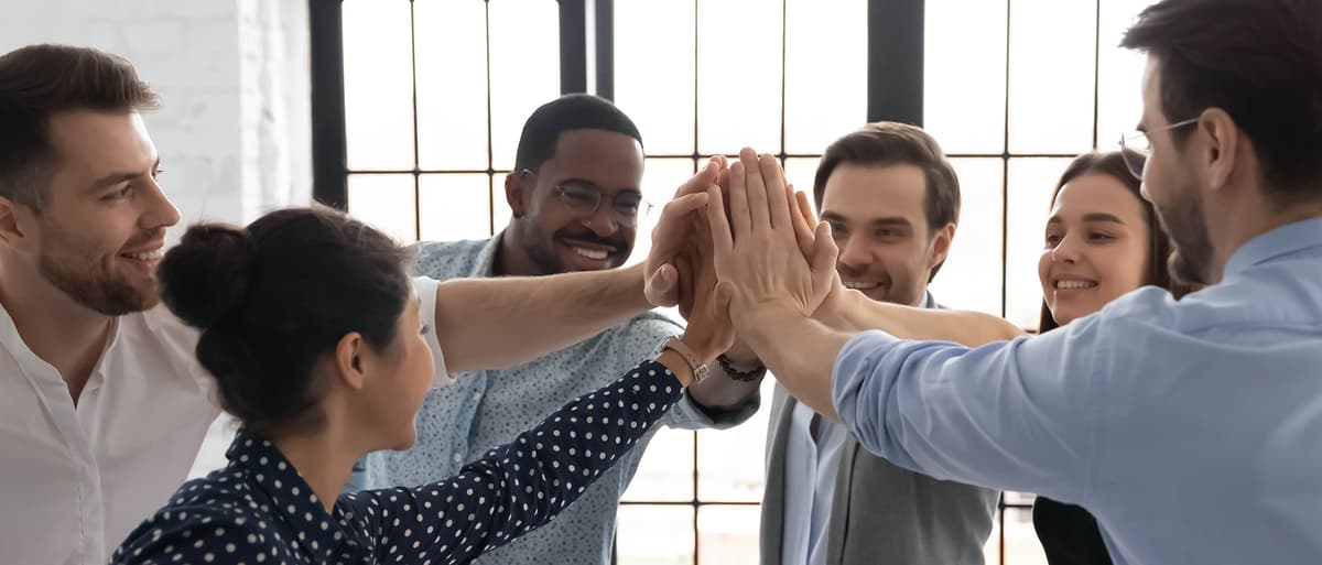 Business professionals celebrating successful project completion